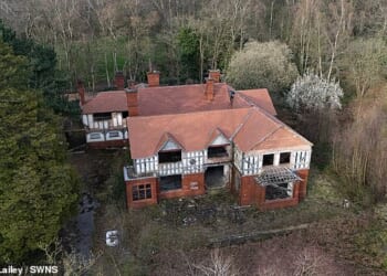The forgotten mock-Tudor style property, which overlooks the rolling fields of the Cheshire Plains, has sat decaying surrounded by multi-million-pound homes for nearly two decades
