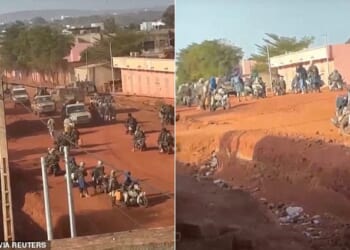 Images show a group of armed men on motorbikes standing on a street in Kati and vehicles moving through the group near the capital city Bamako, Mali