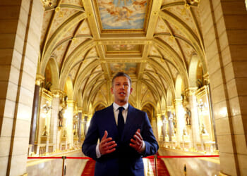 Hungary feels pressure early to put its democracy back on track
