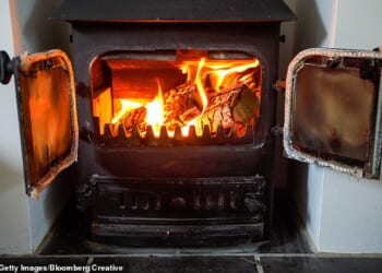 A woman who monitored pollution levels in her parents' home after using her wood-burner has revealed the concerning results (stock image)