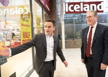 Richard Walker, the boss of Iceland (pictured with Sir Keir Starmer in 2024), has offered a job to the sacked Waitrose worker