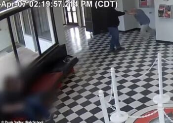 Security camera footage captured the moment Kirk Moore, the principal of Pauls Valley High School in Oklahoma, charged at gunman Victor Lee Hawkins