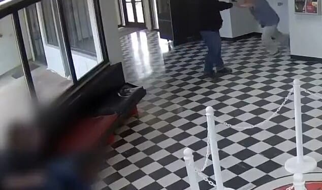 Security camera footage captured the moment Kirk Moore, the principal of Pauls Valley High School in Oklahoma, charged at gunman Victor Lee Hawkins