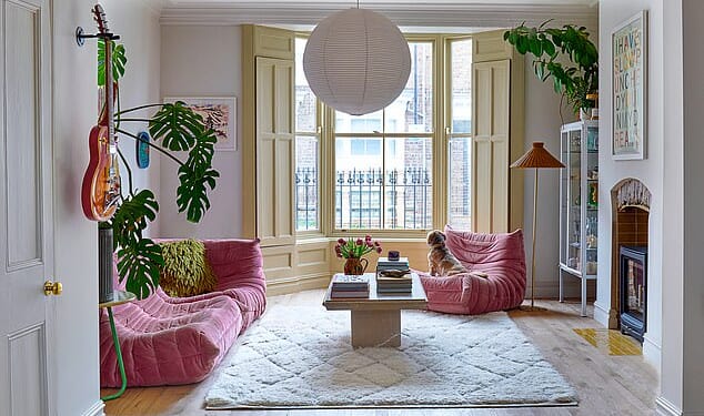 The living room is a sanctuary for Lisa and Buddy (the dog, pictured) and was previously used by a MasterChef winner to host supperclubs. The Togo sofa and chair are from Ligne Roset and have been with Lisa for eight years. The coffee table is an Ebay find and the rug is La Redoute. The flooring is by Parador.
