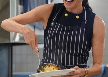 An industry expert predicted Meghan could have scored a $20,000 paycheque from MasterChef. She is pictured serving up a frittata at a Melbourne women's shelter