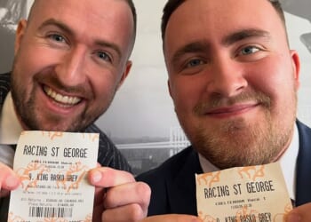 Irish 'tipster' Robert Heneghan and darts star Luke Littler show off their winning tickets at the Cheltenham Festival earlier this year