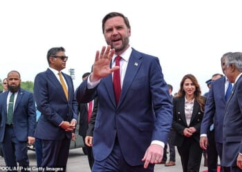Vance waves hello upon his arrival for the US-Iran peace talks in Islamabad on April 11