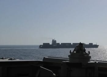 Iran has warned the US it will 'soon retaliate' after the US Navy seized an Iranian-flagged cargo ship in the Strait of Hormuz