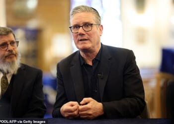 Keir Starmer is fighting to quell dissent in his ranks today after dozens of MPs defied his threats to back a standards probe into the Mandelson scandal
