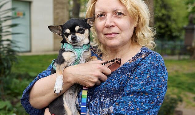 Becki walks her tiny chihuahua Tita at least once a day