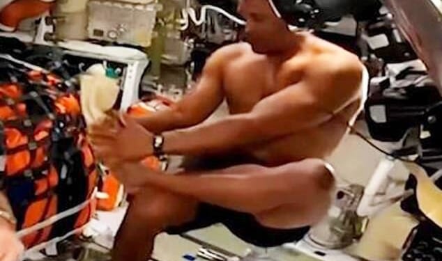 Astronaut Victor Glover (pictured) has become an unexpected sex symbol - after being caught a on camera taking a space shower