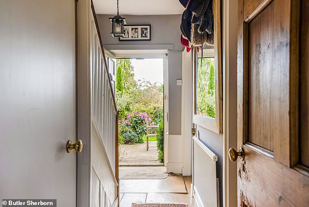 The property being sold by Butler Sherborn has a warm and welcoming entrance hall