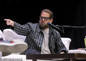 Jonah Hill, 42, spoke about his experiences working with 'f***ing nuts' director David O. Russell when he was 21 and making his debut in I Heart Huckabees during a live taping of the Smartless podcast on Saturday in LA (pictured)