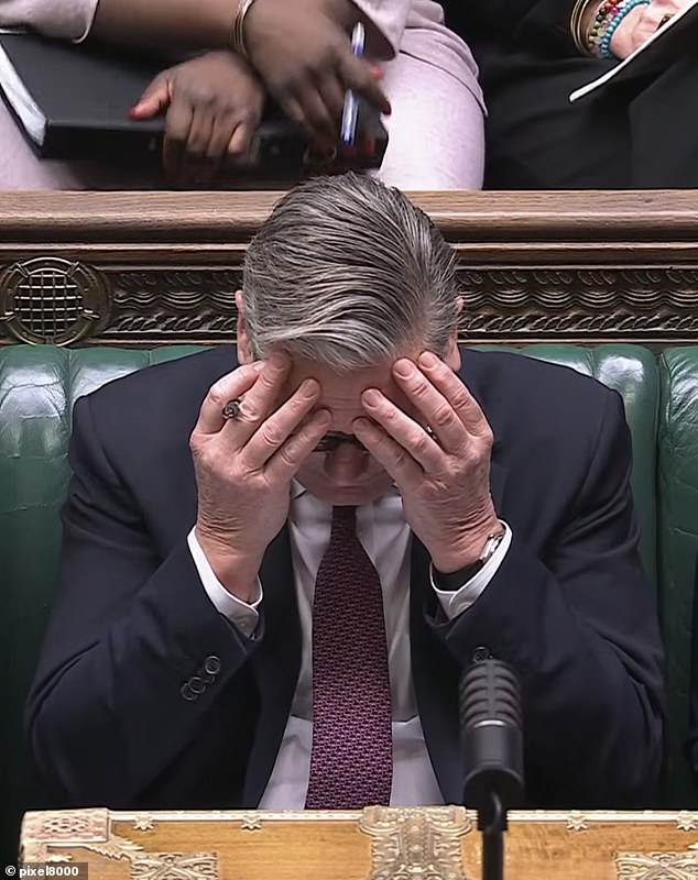 Keir Starmer holds his head in his hands as Kemi Badenoch questions him over North Sea Oil at PMQs
