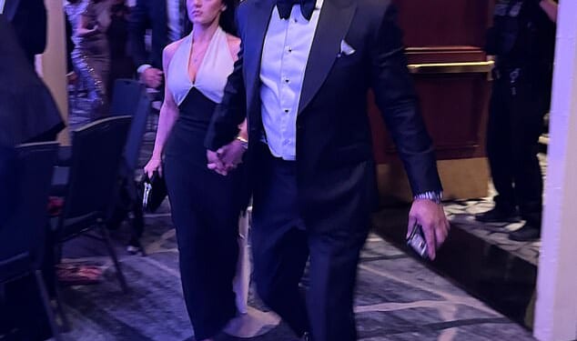 FBI Director Kash Patel and his girlfriend, Alexis Wilkins, leave the White House Correspondents' Dinner after a shooter opened fire