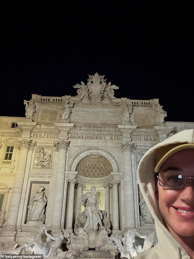 The singer added that she felt the need to put something in the Trevi fountain 'for good luck' before placing her credit card in. However, she grabbed the card before it could float away