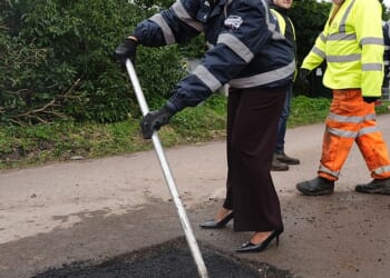 The Conservative opposition leader was pictured smoothing out the roads today in the West Midlands as part of her campaign trail for the local elections