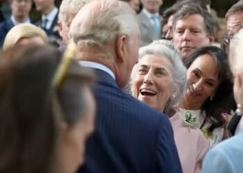 King Charles momentarily broke royal protocol in a rare moment of public affection yesterday as he reunited with an old friend during his US state visit