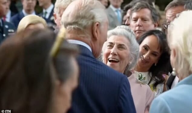 King Charles momentarily broke royal protocol in a rare moment of public affection yesterday as he reunited with an old friend during his US state visit