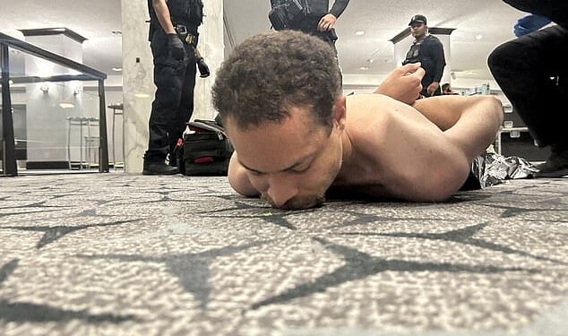 Law enforcement personnel detain Cole Tomas Allen, a suspect in the shooting incident at the White House Correspondents' Association dinner, in Washington, D.C., U.S. April 25, 2026. DONALD J TRUMP via Truth Social/Handout via REUTERS    THIS IMAGE HAS BEEN SUPPLIED BY A THIRD PARTY. MANDATORY CREDIT. REFILE - ADDING NAME OF THE SUSPECTED SHOOTER  VERIFICATION: Reuters was able to verify the location from flooring and windows that match corroborating footage. Date confirmed from the government statement of the incident. No old results were posted online before April 25. FBI confirmed that National Capital Response Squad has responded to a shooting at the Washington Hilton and added that the subject is in custody.     TPX IMAGES OF THE DAY