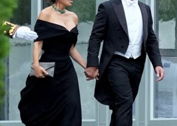 Lauren Sanchez put on an eye-popping display alongside husband Jeff Bezos at the state dinner for King Charles and Queen Camilla