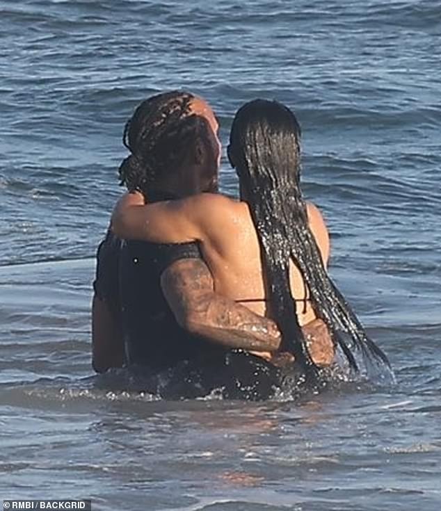 The 45-year-old reality TV star wore her raven hair down