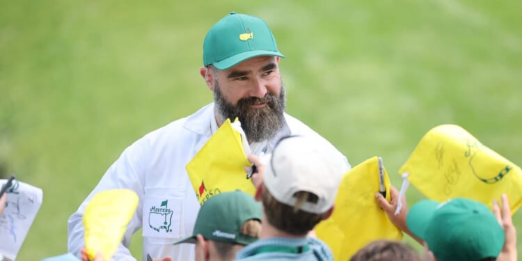 Jason Kelce signs his autograph for patrons near the ninth hole during the Par Three Contest prior to the 2026 Masters Tournament at Augusta National Golf Club on April 8, 2026, in Augusta, Georgia.