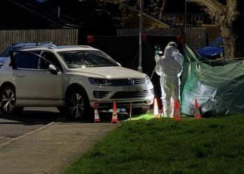 The Volkswagen Touareg could be seen being examined by police after the crash