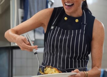 The Duchess of Sussex was inundated with compliments as she served up lunch to homeless women at a shelter in Melbourne on the first day of her and Prince Harry's four-day trip