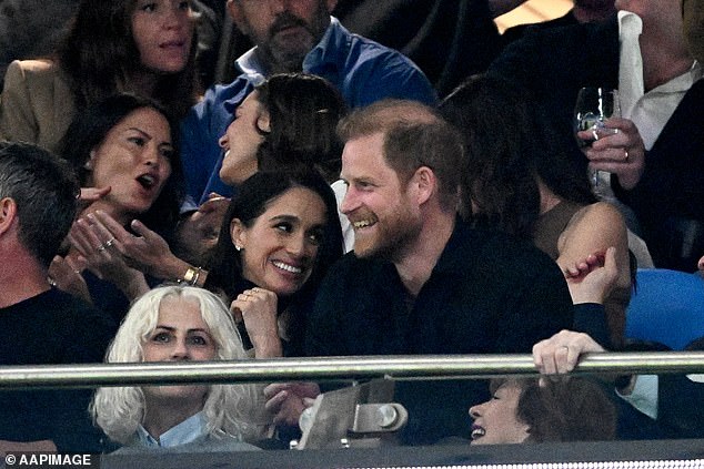 The couple share a laugh as they enjoy some quiet time to enjoy the Waratahs' hospitality