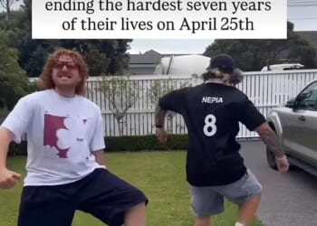 Meghan reposted a video showing two men dancing joyfully, with a caption about seven hard years comng to an end