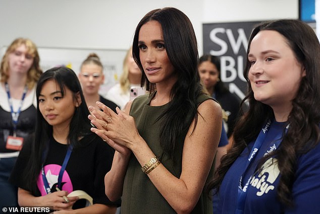 Alongside Prince Harry, Meghan today met students at Swinburne University of Technology in Melbourne, where she told students she was the most 'trolled person in the entire world'