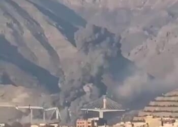 US-Israeli strikes destroyed Iran's tallest bridge after Donald Trump threatened to bomb Tehran 'back to the 'Stone Age'