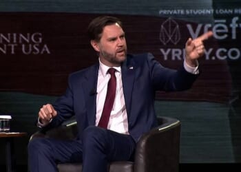 US Vice-President JD Vance was heckled mid-speech as he took aim at Pope Leo over his criticism of the war in Iran