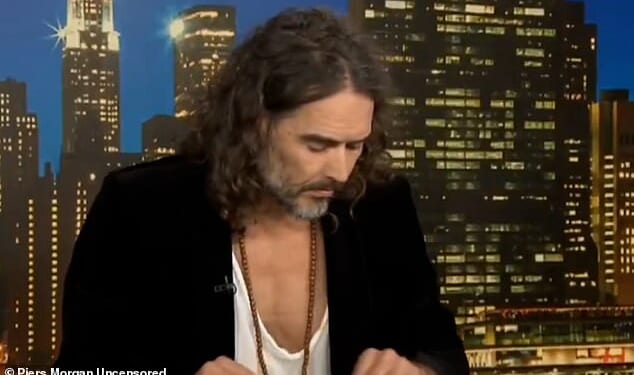 This is the excruciating moment Russell Brand failed to find a Bible passage after Piers Morgan quizzed him over reading it aloud in court
