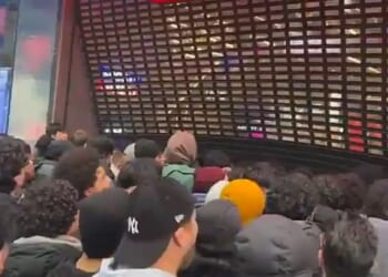 A mob of crazed Pokemon fans forced open the shutters of the flagship Sports Direct store in central London as they stormed inside for new valuable trading cards