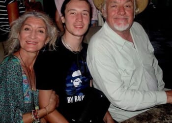 Family devastated by a brutal attack: Finbar Sullivan (centre) with his mother Leah Seresin and father Christopher Sullivan