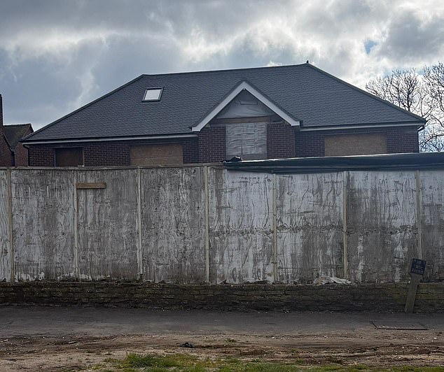 The windows of the property in High Wycombe were boarded up this week - with building work still underway