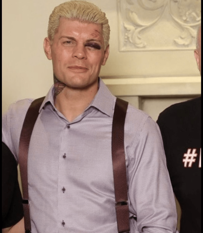 Cody Rhodes with a bruised eye and forehead cut.