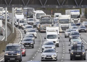 Heavy traffic is seen on the M25 near Egham in Surrey as many travellers' Easter getaway begins - with motoring organisations predicted this year's would be the busiest since 2022