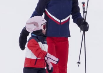 Pippa Middleton, 42, guides her young daughters Grace, five, and Rose, three, through the snow on a family ski break in the French Alps