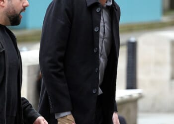 Thomas Browne, 32, (pictured) had his hand crushed by being slammed in a door and was punched twice in the face by the son, who had 'grown frustrated and angry' over a long-term issue with the central heating at his mother's council property in Hammersmith