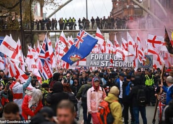 Thousands of far-right Britain First protestors (pictured) marched through Manchester city centre on Saturday