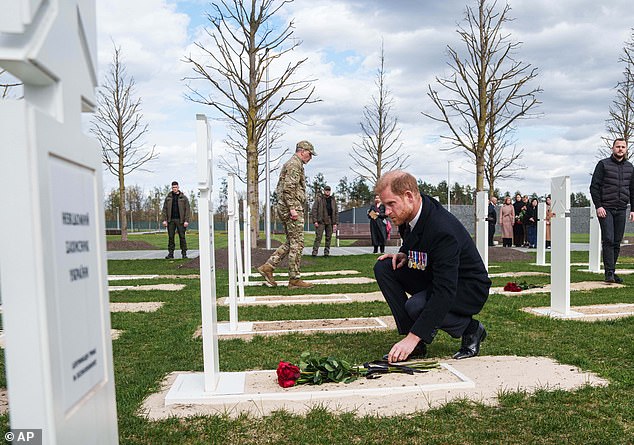 Prince Harry today laid flowers at the grave of an unidentified Ukrainian soldier killed in battle