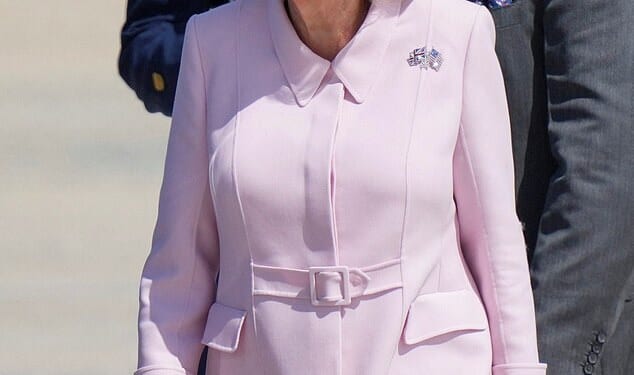 Her Majesty exuded elegance in a new candy floss Dior coat dress as she disembarked the plane in Washington. She also wore the historic Union Jack and the Stars and Stripes brooch