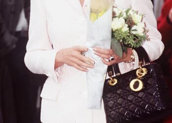 It was a design loved by Princess Diana, and now Queen Camilla has been spotted carrying the Lady Dior bag (Diana is seen wearing the bag in London, 1996)