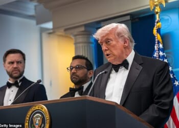 A black tie-clad President addresses reporters after Saturday night's shooting