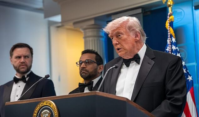 A black tie-clad President addresses reporters after Saturday night's shooting