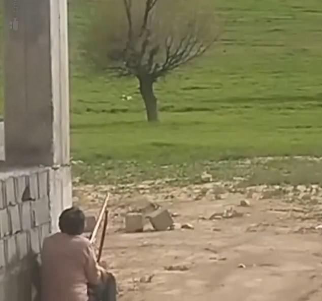 Footage has emerged of Iranians shooting at US rescue planes