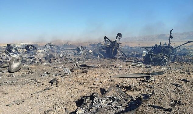 The remains of a US helicopter and two transport planes, which Iran claimed to have shot down amid the search for America's missing colonel
